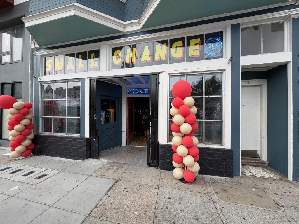 Storefront with balloons from grand opening